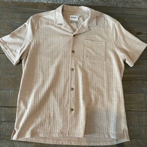 Never worn Men’s knit short sleeve button up shirt. Light beige. Size Large.